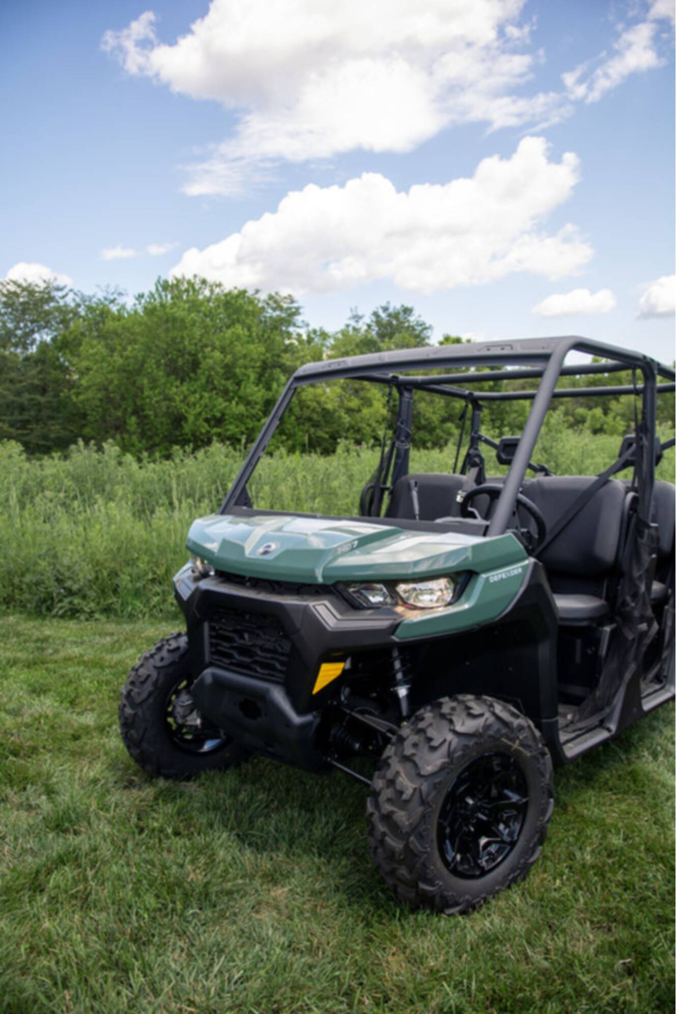 A photo of this 2026 Can-Am Defender MAX DPS HD7 Compass Green