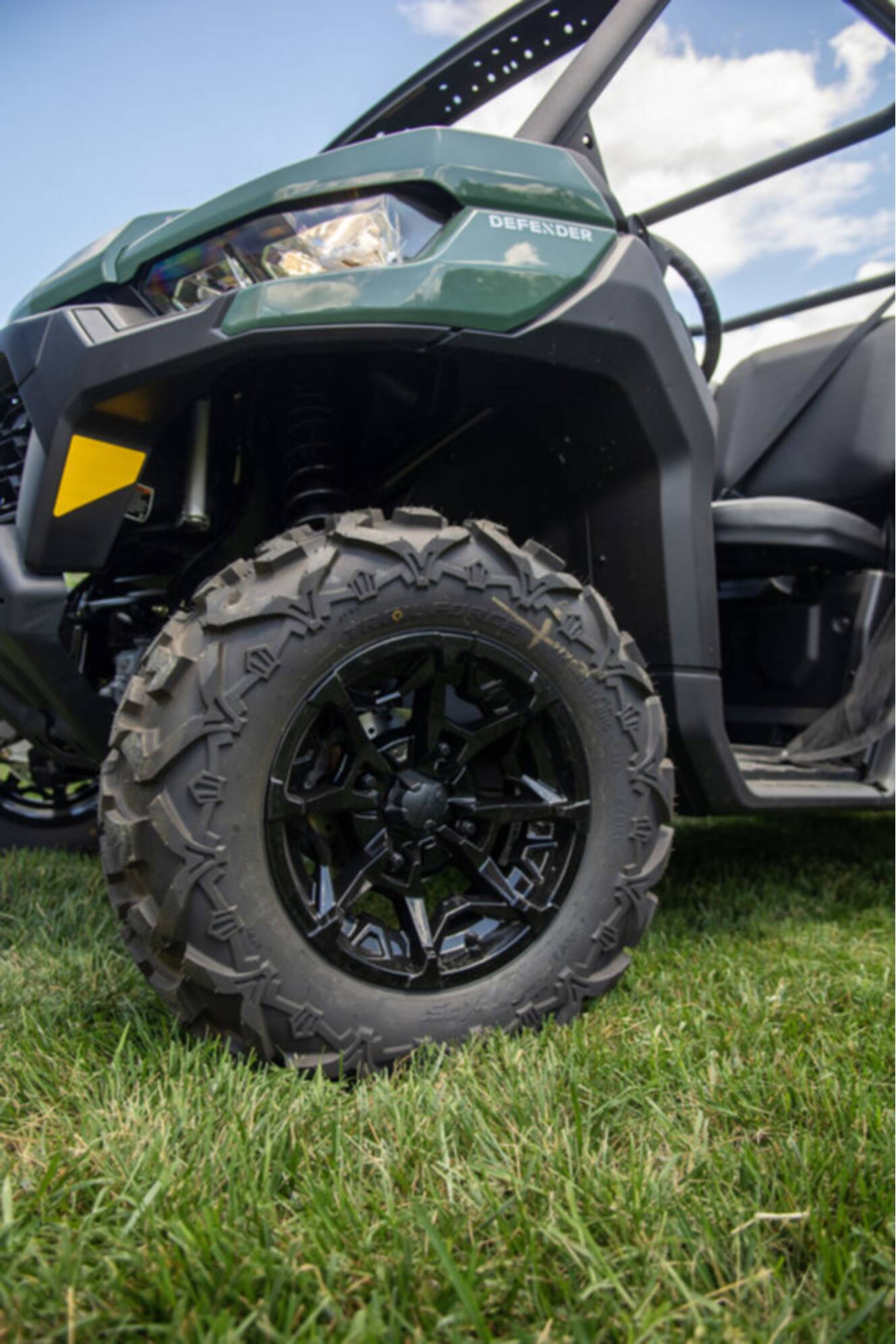 A photo of this 2026 Can-Am Defender MAX DPS HD7 Compass Green