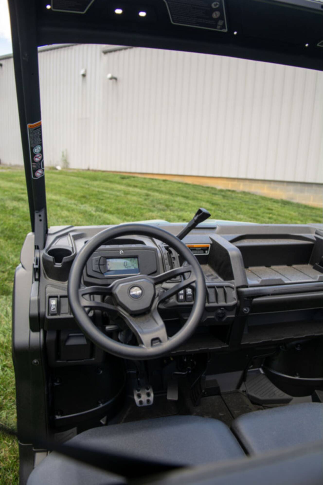 A photo of this 2026 Can-Am Defender MAX DPS HD7 Compass Green