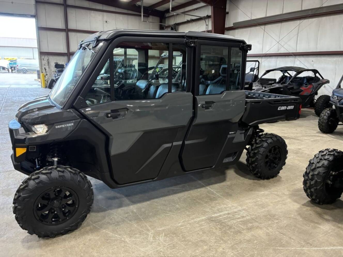 A photo of this 2027 Can-Am Defender MAX DPS CAB HD10 Dolomite Grey