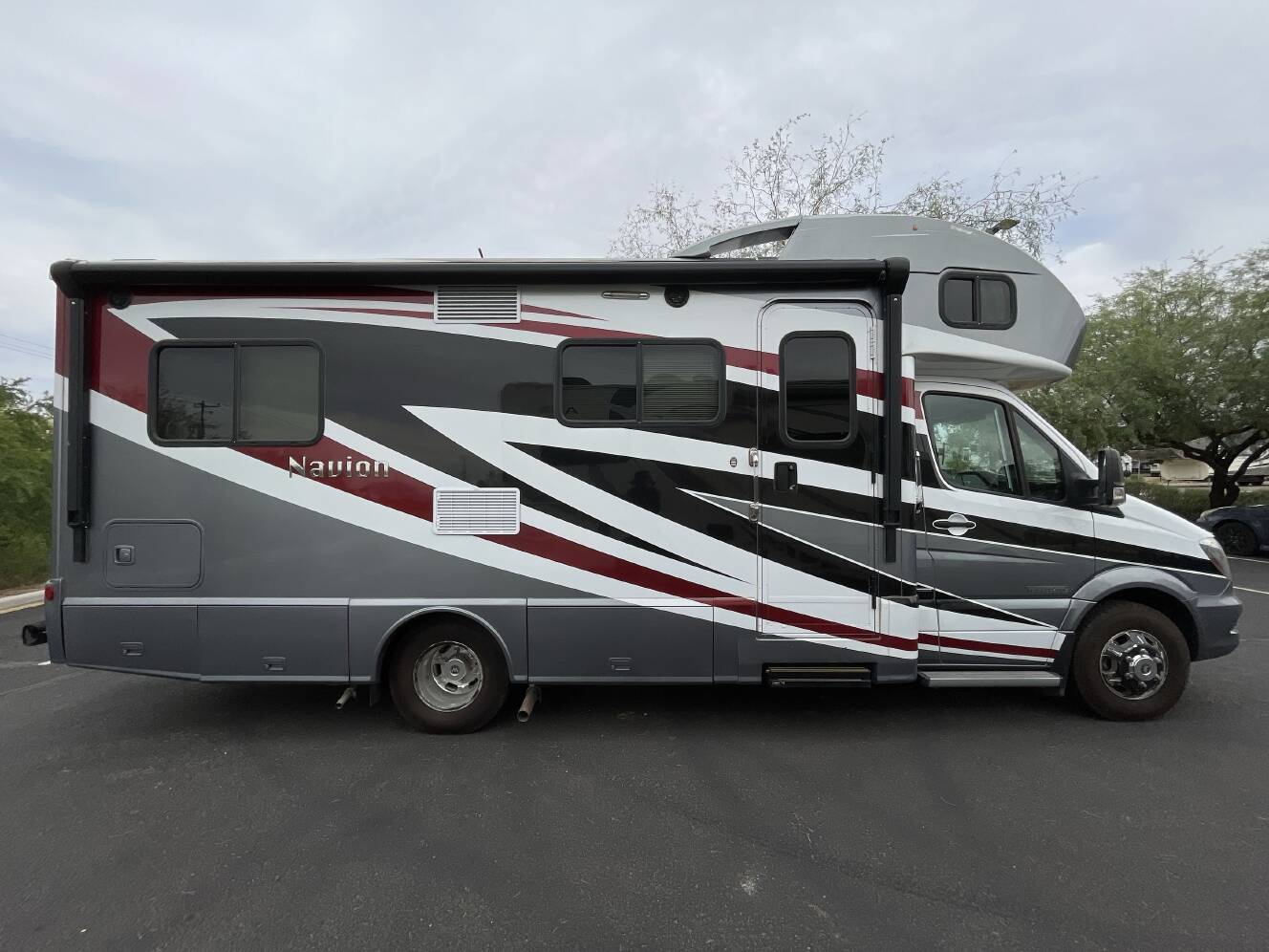 A photo of this 2015 Itasca NAVION 24V