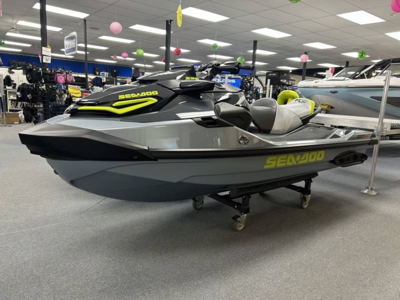 A photo of this 2026 Sea-Doo RXP-X 325 w/ Sound System-Ice Metal/ Manta Green