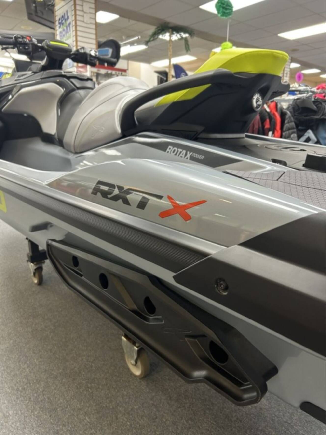 A photo of this 2026 Sea-Doo RXP-X 325 w/ Sound System-Ice Metal/ Manta Green