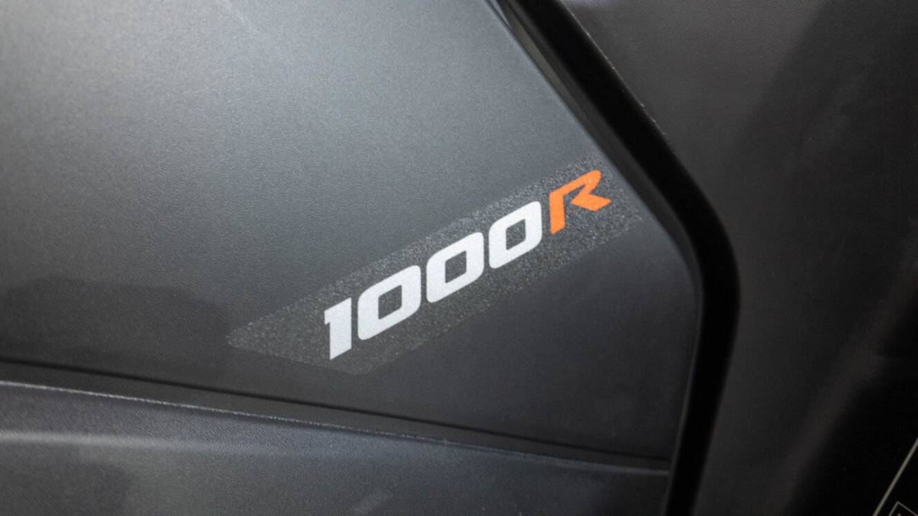 A photo of this 2026 Can-Am Outlander X mr 1000R Loft Green Satin