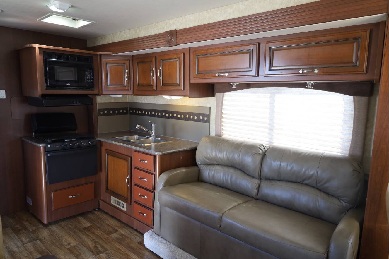 A photo of this 2013 Fleetwood Storm 32BH