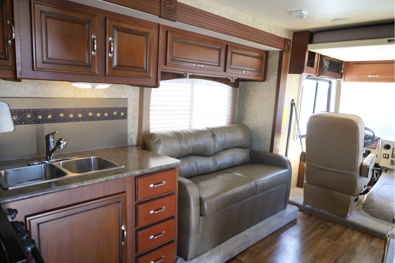 A photo of this 2013 Fleetwood Storm 32BH