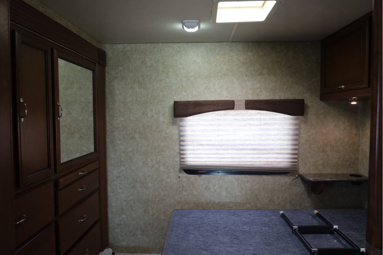 A photo of this 2013 Fleetwood Storm 32BH