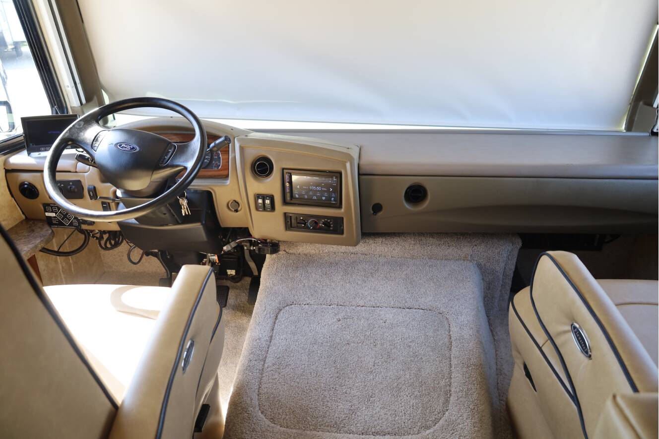 A photo of this 2013 Fleetwood Storm 32BH