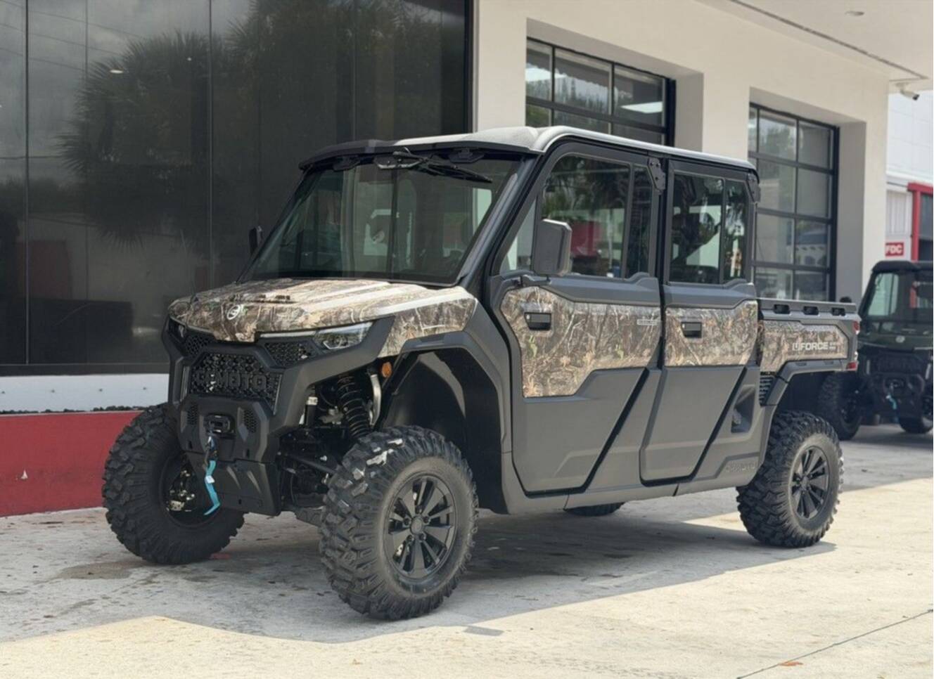 A photo of this 2027 CFMOTO UFORCE U10 XL Pro Highland EPS TrueTimber® Kanati Camo