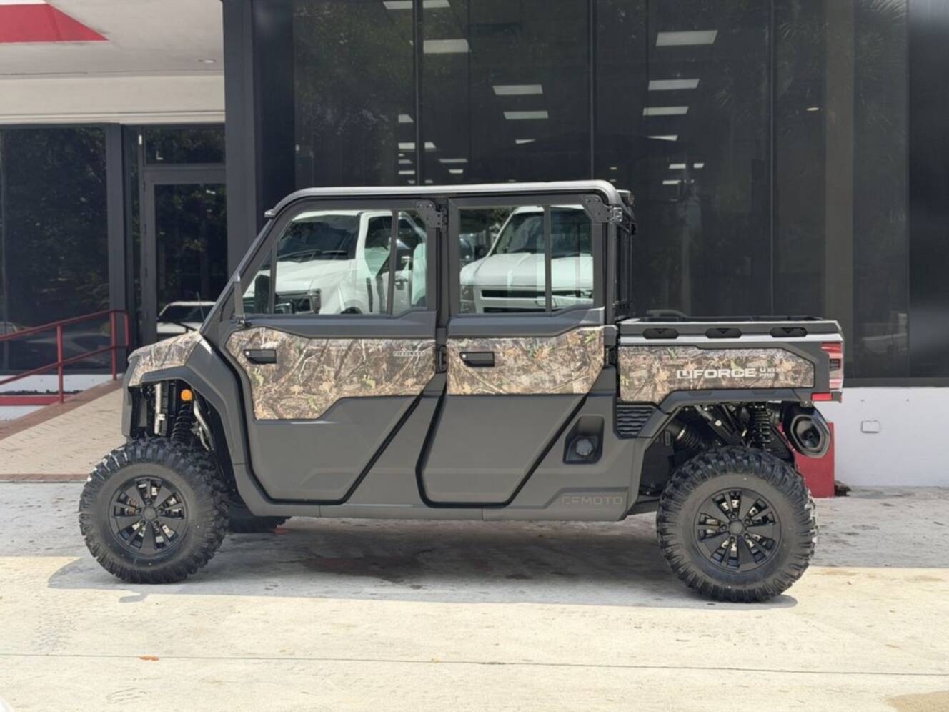 A photo of this 2027 CFMOTO UFORCE U10 XL Pro Highland EPS TrueTimber® Kanati Camo
