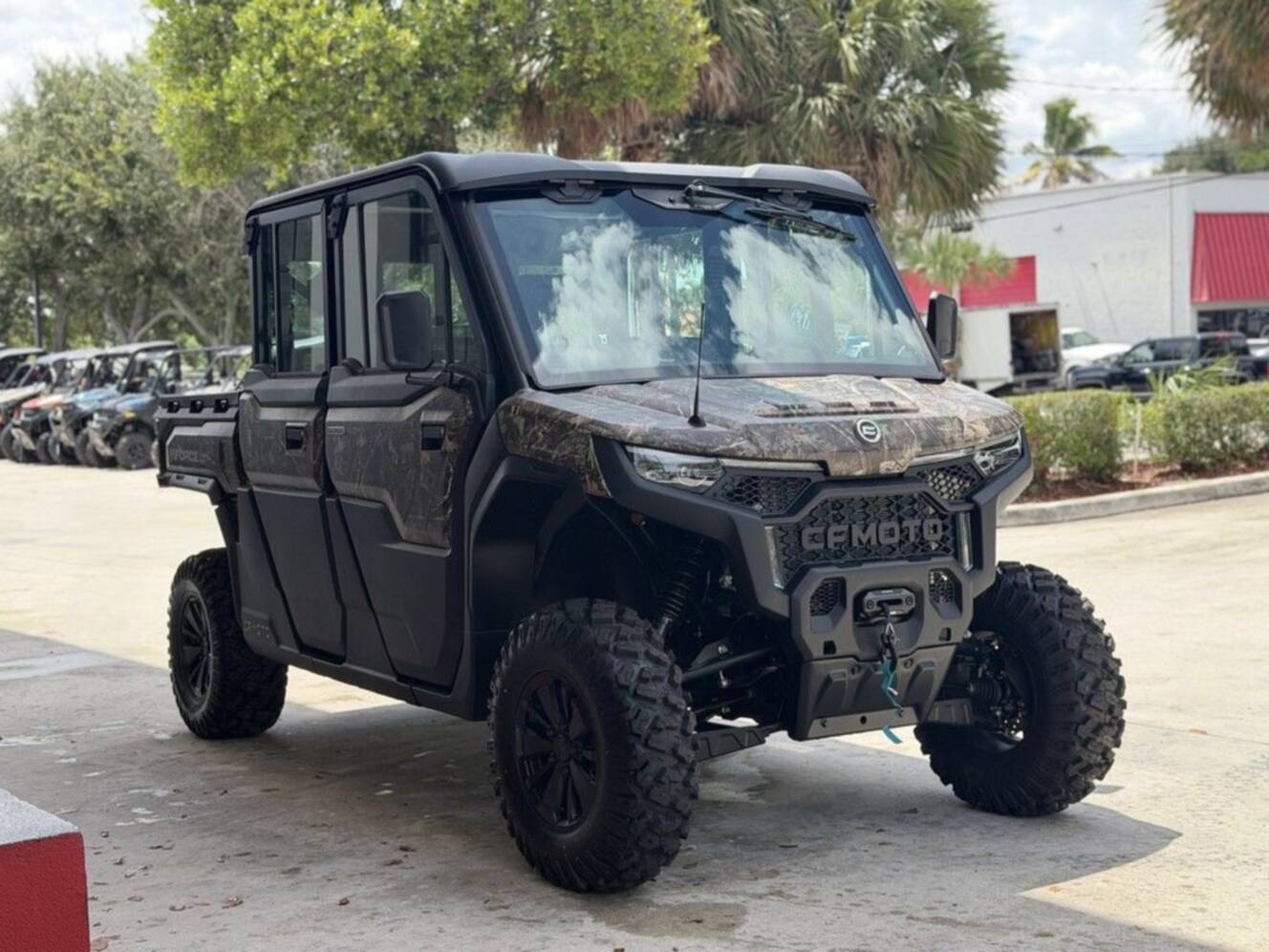 A photo of this 2027 CFMOTO UFORCE U10 XL Pro Highland EPS TrueTimber® Kanati Camo