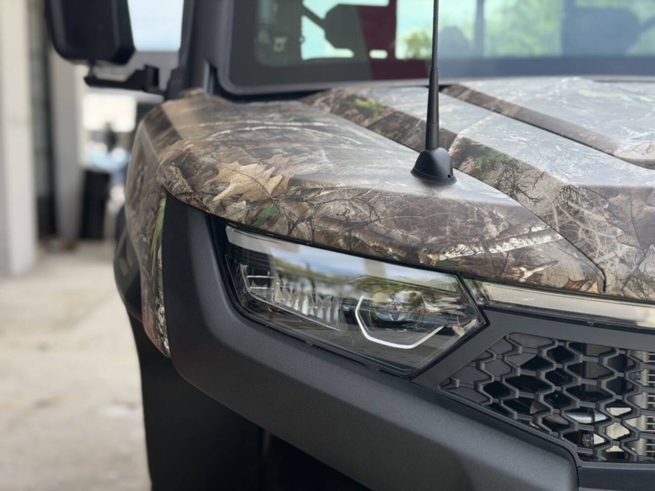 A photo of this 2027 CFMOTO UFORCE U10 XL Pro Highland EPS TrueTimber® Kanati Camo