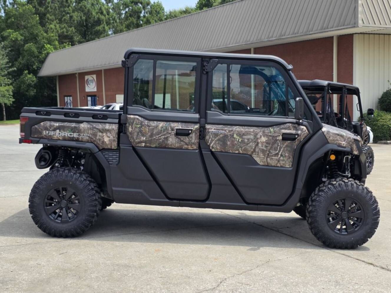 A photo of this 2026 CFMOTO UFORCE U10 XL Pro Highland Camo