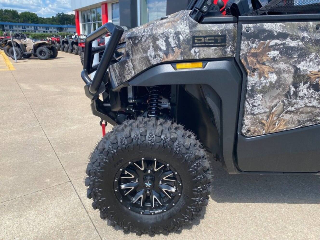 A photo of this 2026 Honda® Pioneer 1000 Deluxe TrueTimber atera camo