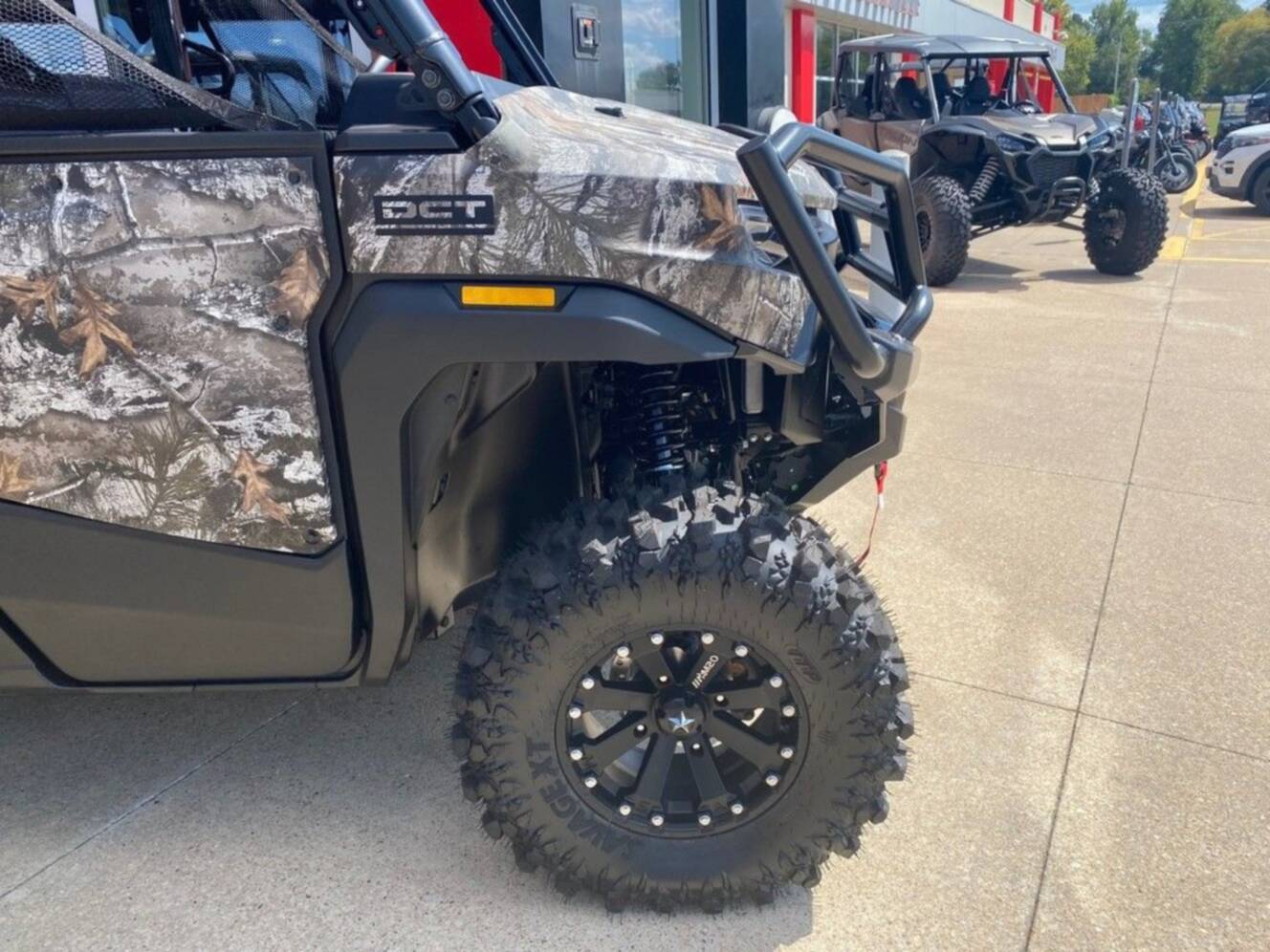 A photo of this 2026 Honda® Pioneer 1000-5 Deluxe TrueTimber Atera Camo