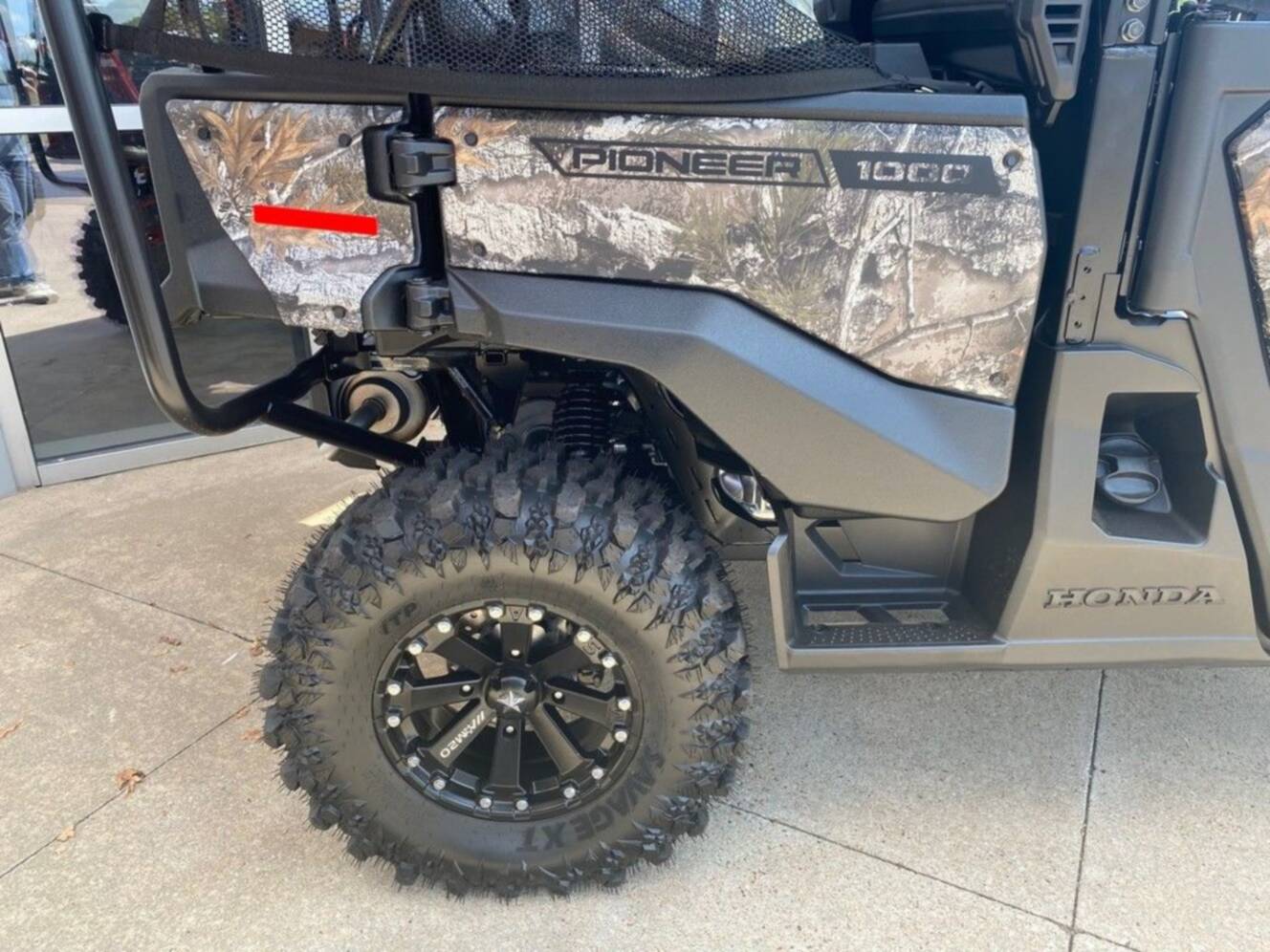 A photo of this 2026 Honda® Pioneer 1000-5 Deluxe TrueTimber Atera Camo
