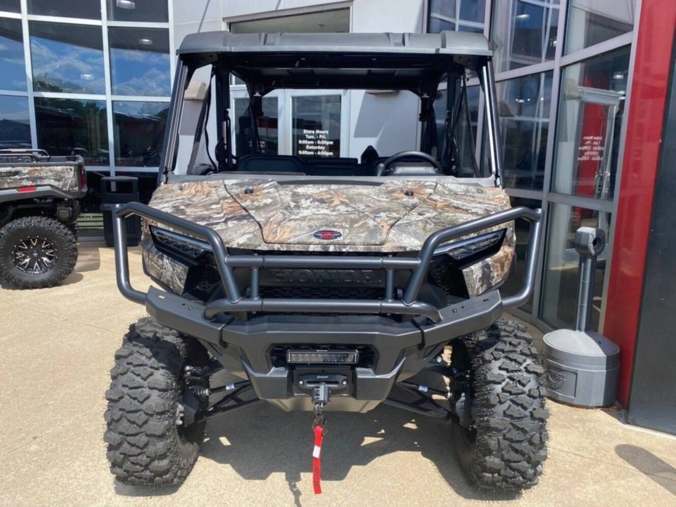 A photo of this 2026 Honda® Pioneer 1000-5 Deluxe TrueTimber Atera Camo