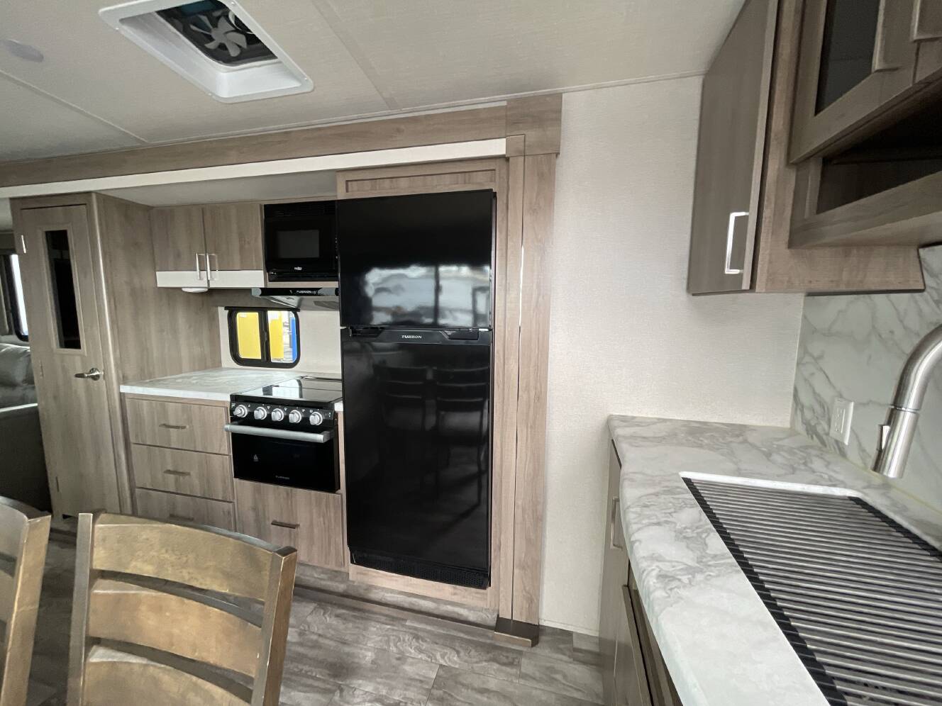 A photo of this 2023 Grand Design IMAGINE 3100RD