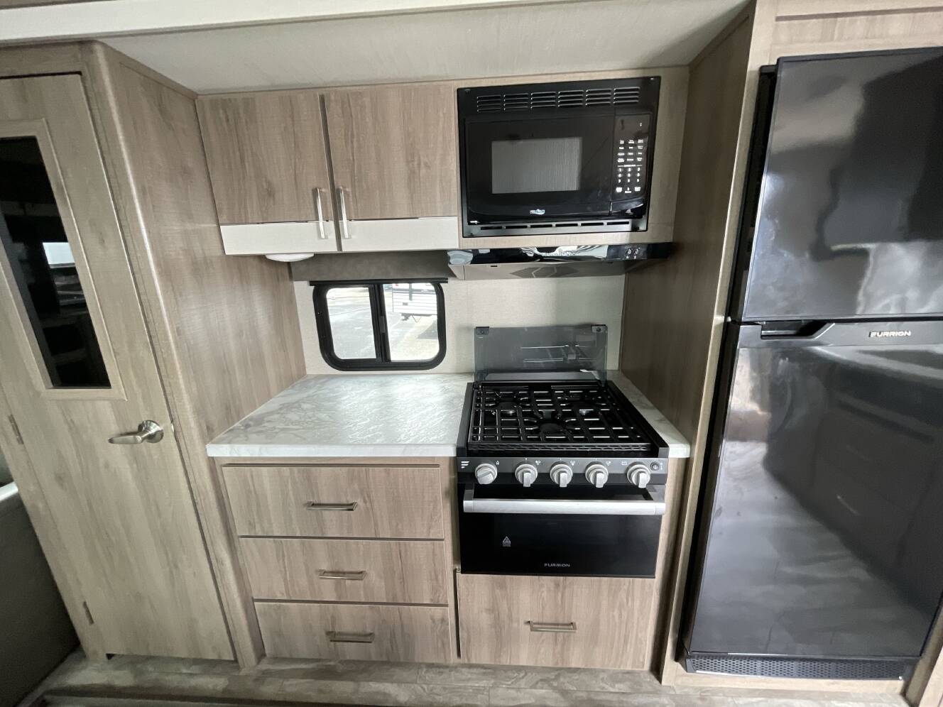 A photo of this 2023 Grand Design IMAGINE 3100RD