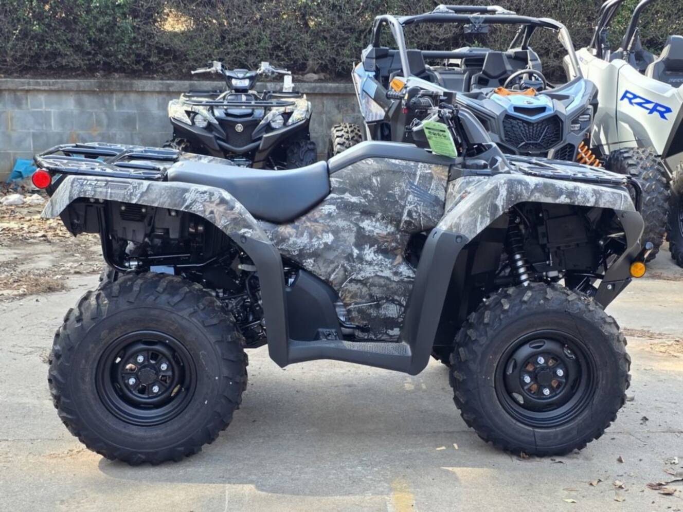 A photo of this 2026 Honda® FourTrax Rancher 4x4 Automatic DCT IRS EPS TrueTimber®