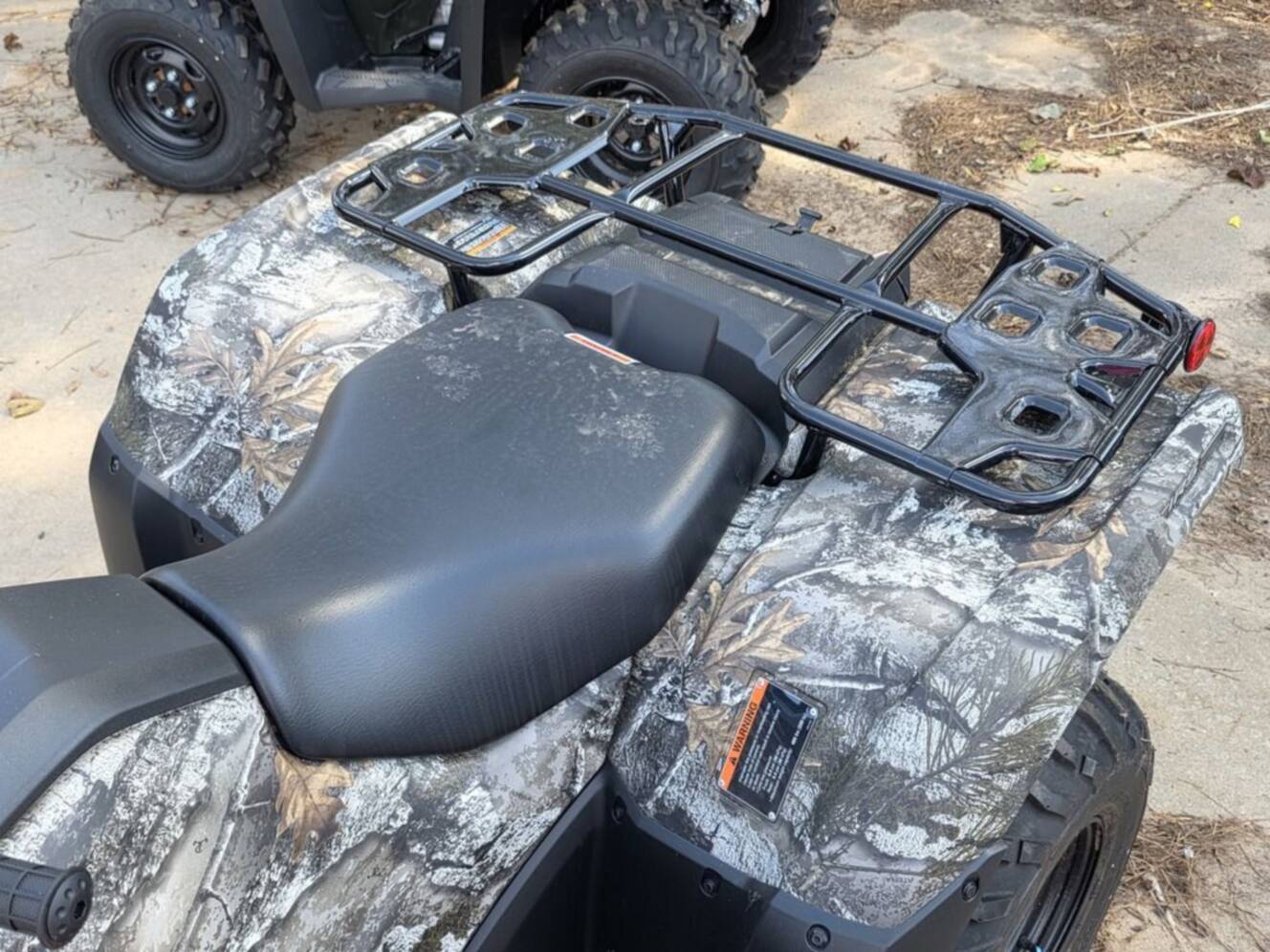 A photo of this 2026 Honda® FourTrax Rancher 4x4 Automatic DCT IRS EPS TrueTimber®