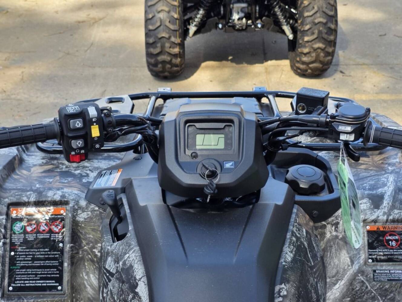 A photo of this 2026 Honda® FourTrax Rancher 4x4 Automatic DCT IRS EPS TrueTimber®