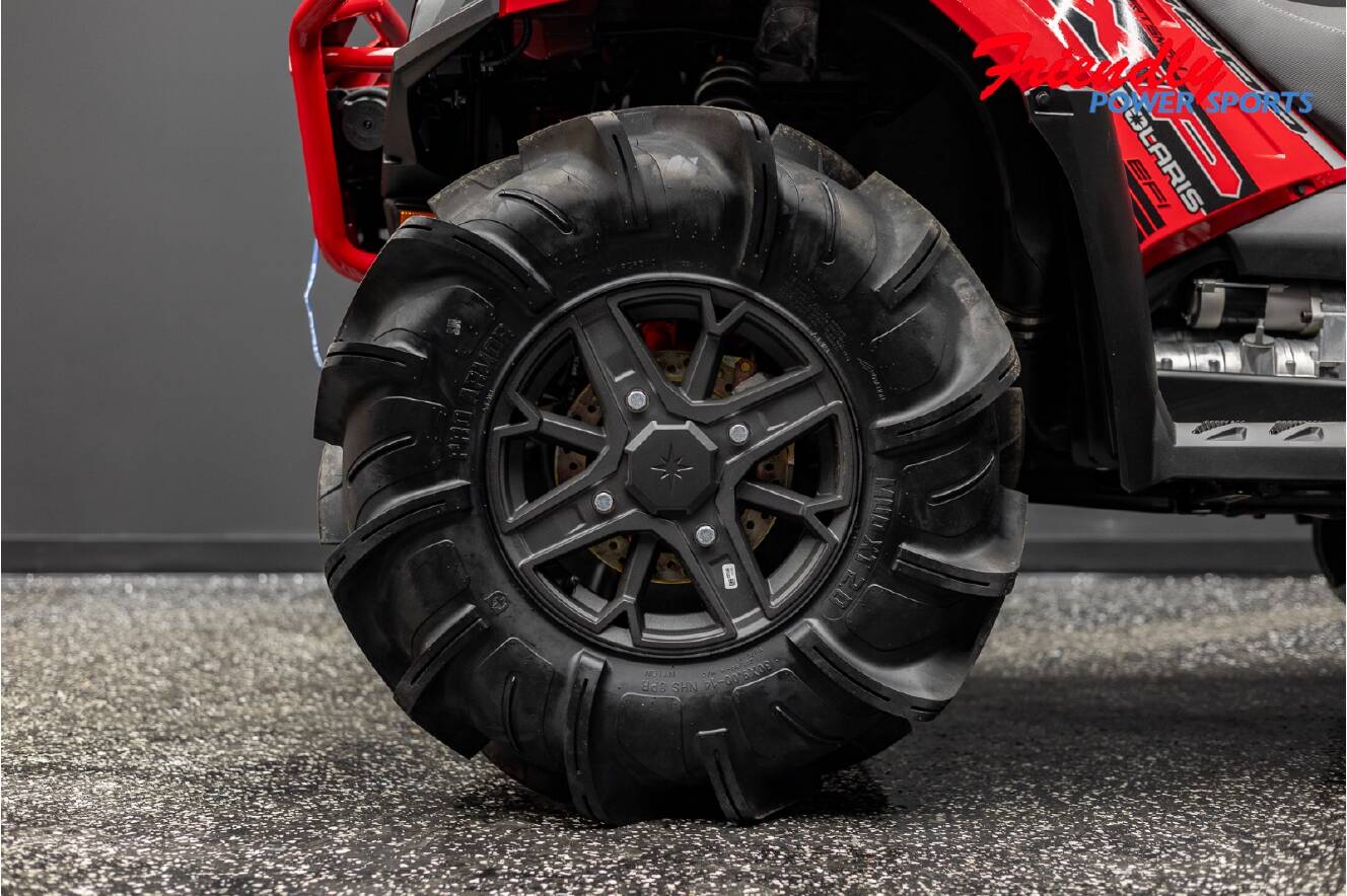 A photo of this 2026 Polaris SPORTSMAN XP 1000 MUD ED INDY RED PEARL Mud Edition