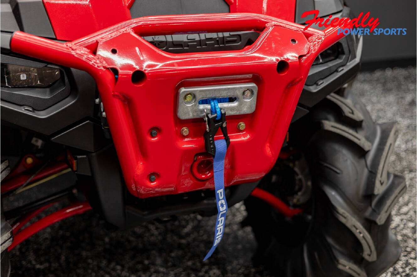 A photo of this 2026 Polaris SPORTSMAN XP 1000 MUD ED INDY RED PEARL Mud Edition