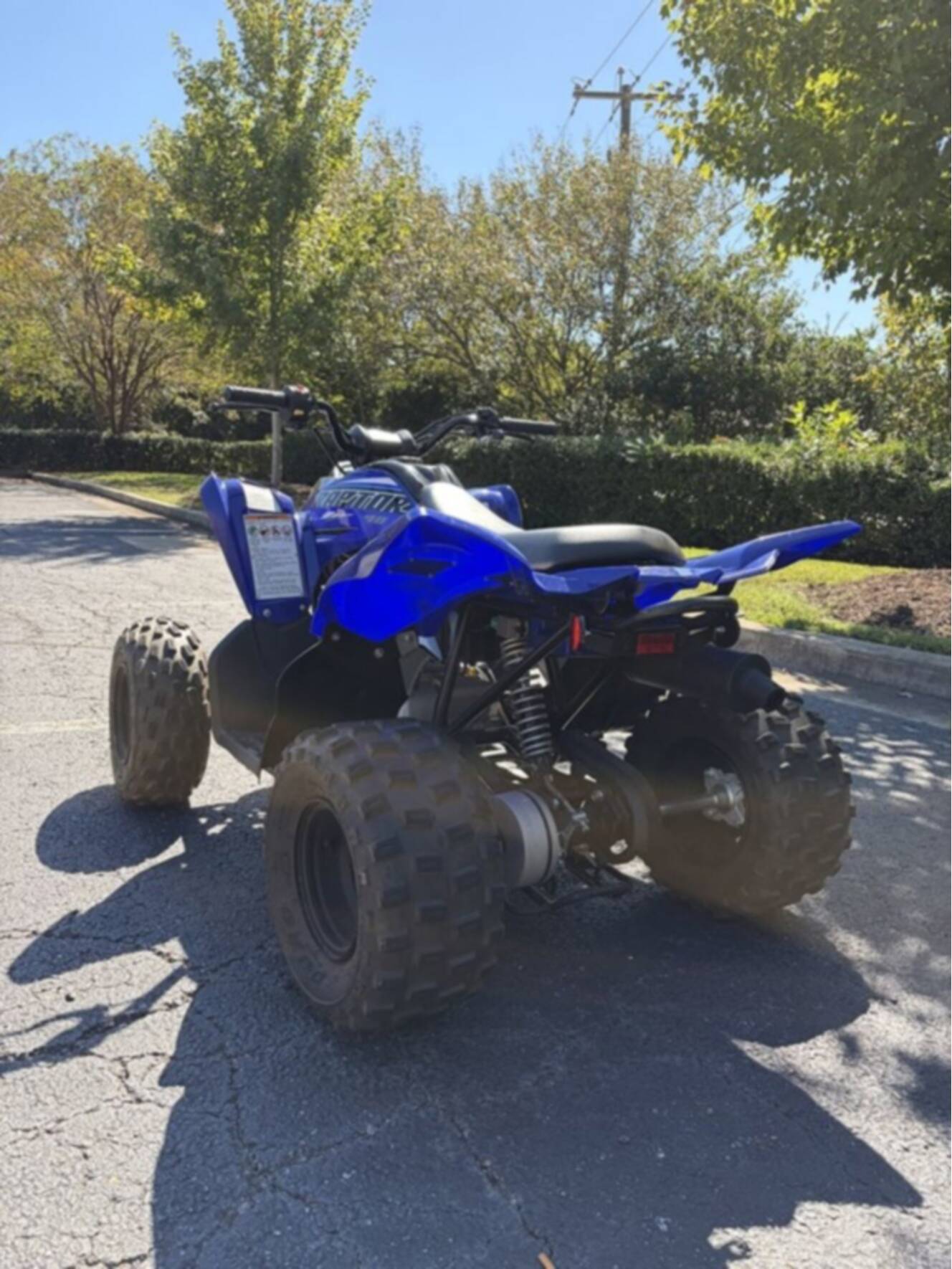 A photo of this 2023 Yamaha Raptor 90