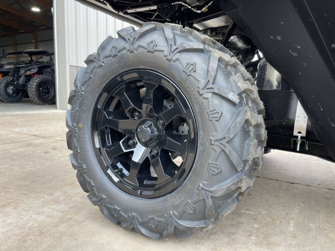 A photo of this 2026 Can-Am Defender DPS HD7 Compass Green