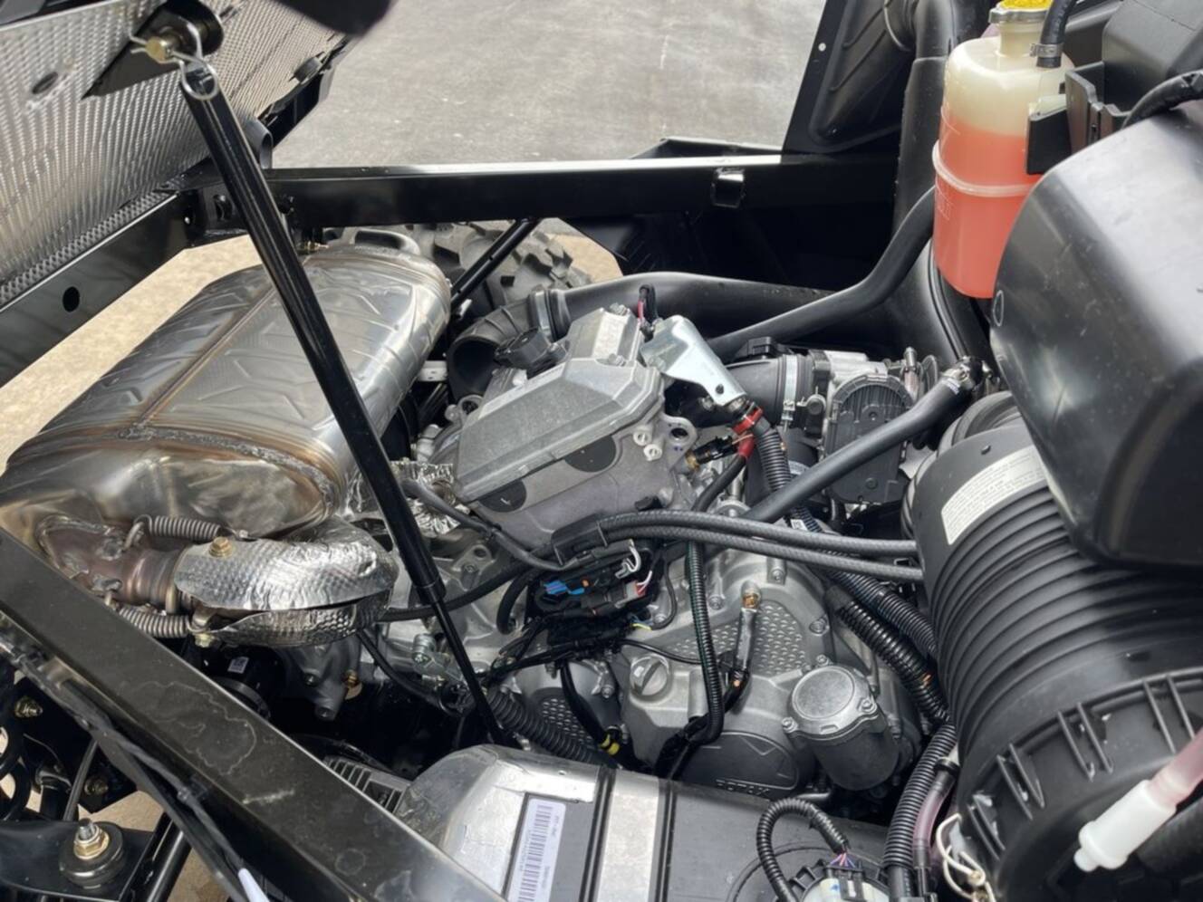 A photo of this 2026 Can-Am Defender DPS HD7 Compass Green