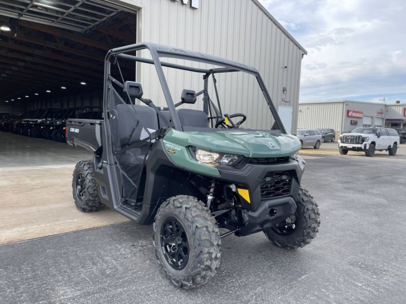 A photo of this 2026 Can-Am Defender DPS HD7 Compass Green