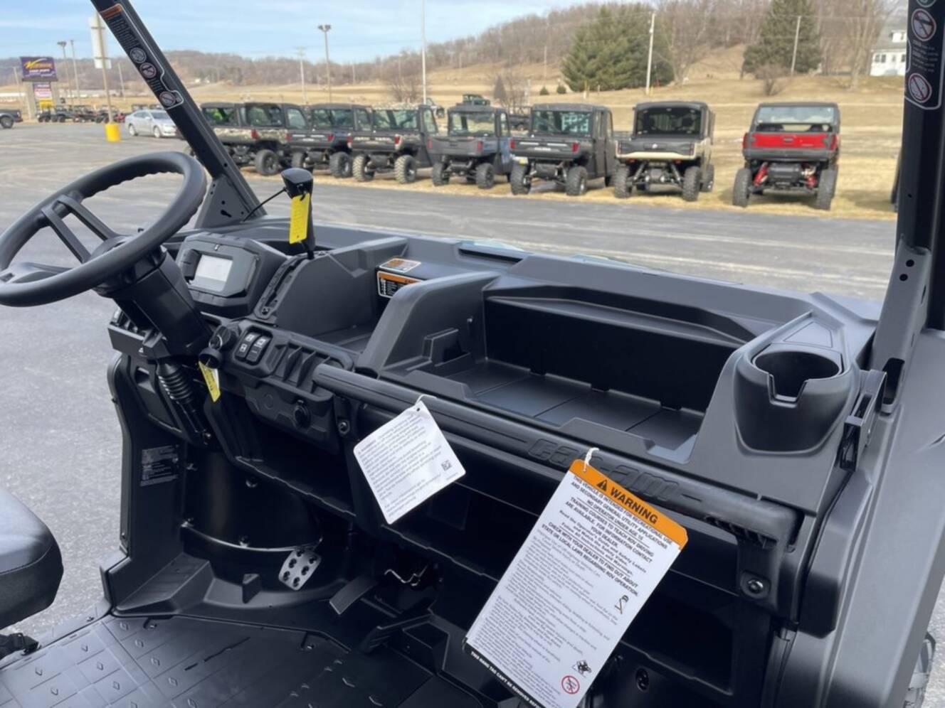A photo of this 2026 Can-Am Defender DPS HD7 Compass Green