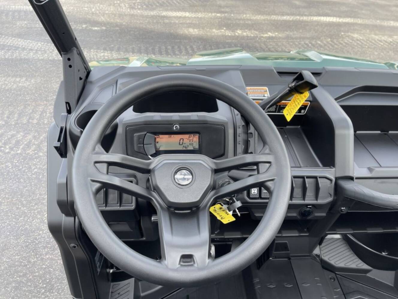 A photo of this 2026 Can-Am Defender DPS HD7 Compass Green