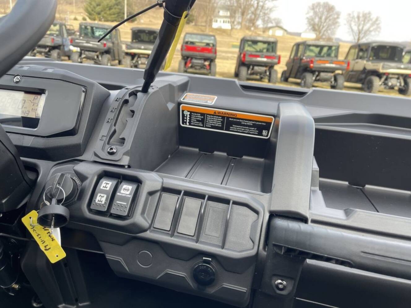 A photo of this 2026 Can-Am Defender DPS HD7 Compass Green