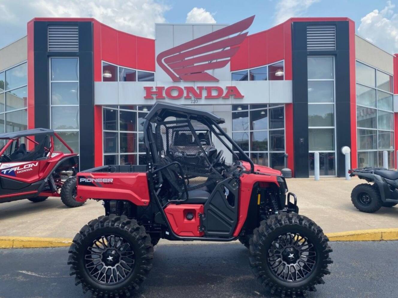 A photo of this 2026 Honda® Pioneer 520