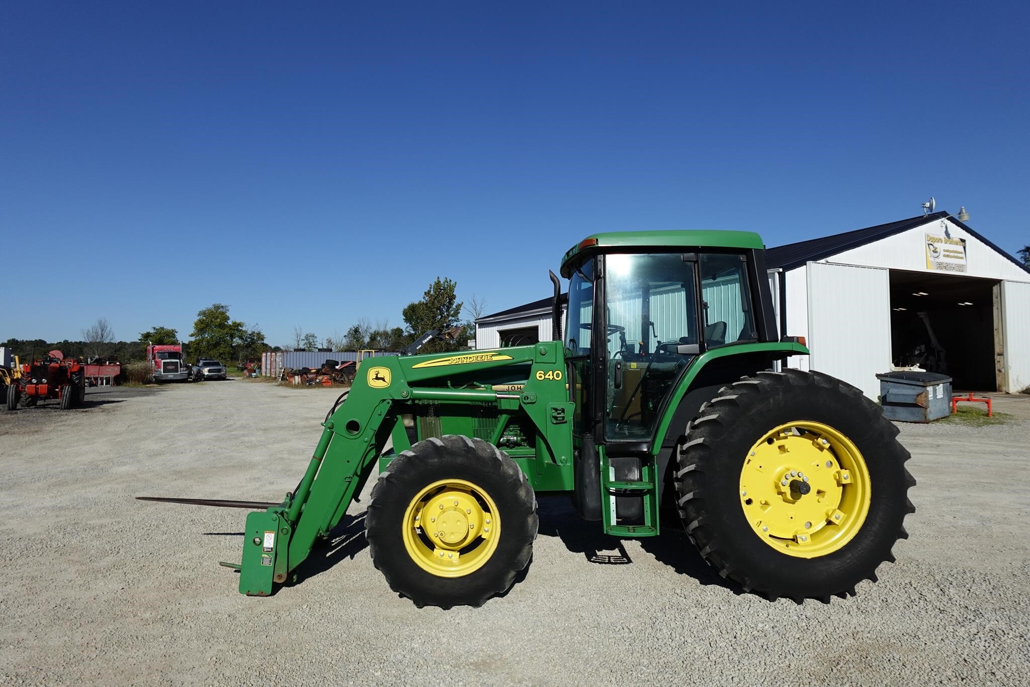 1997 JOHN DEERE 6400 in Versailles, OH