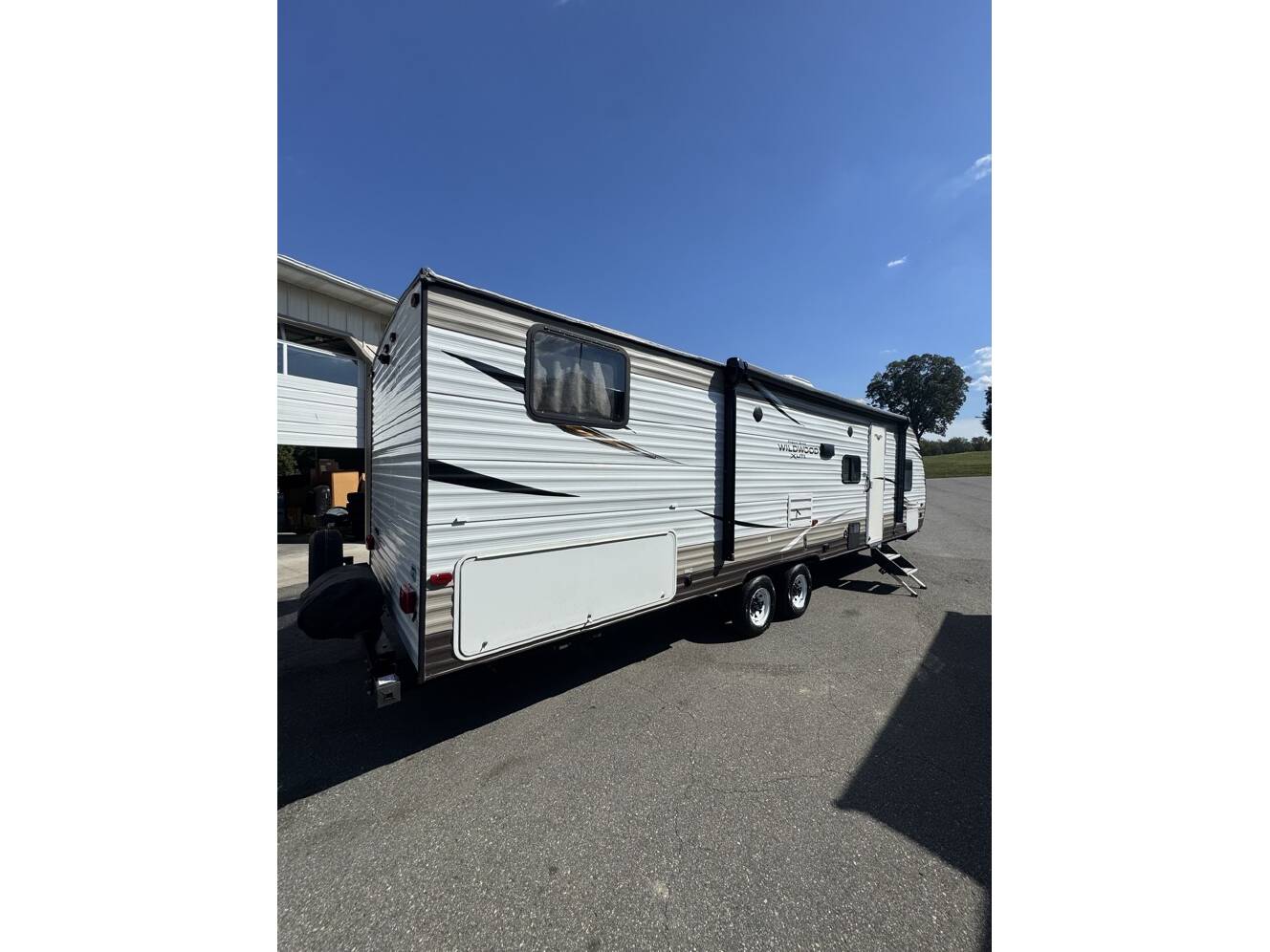 A photo of this 2019 Forest River WILDWOOD 273QBXL