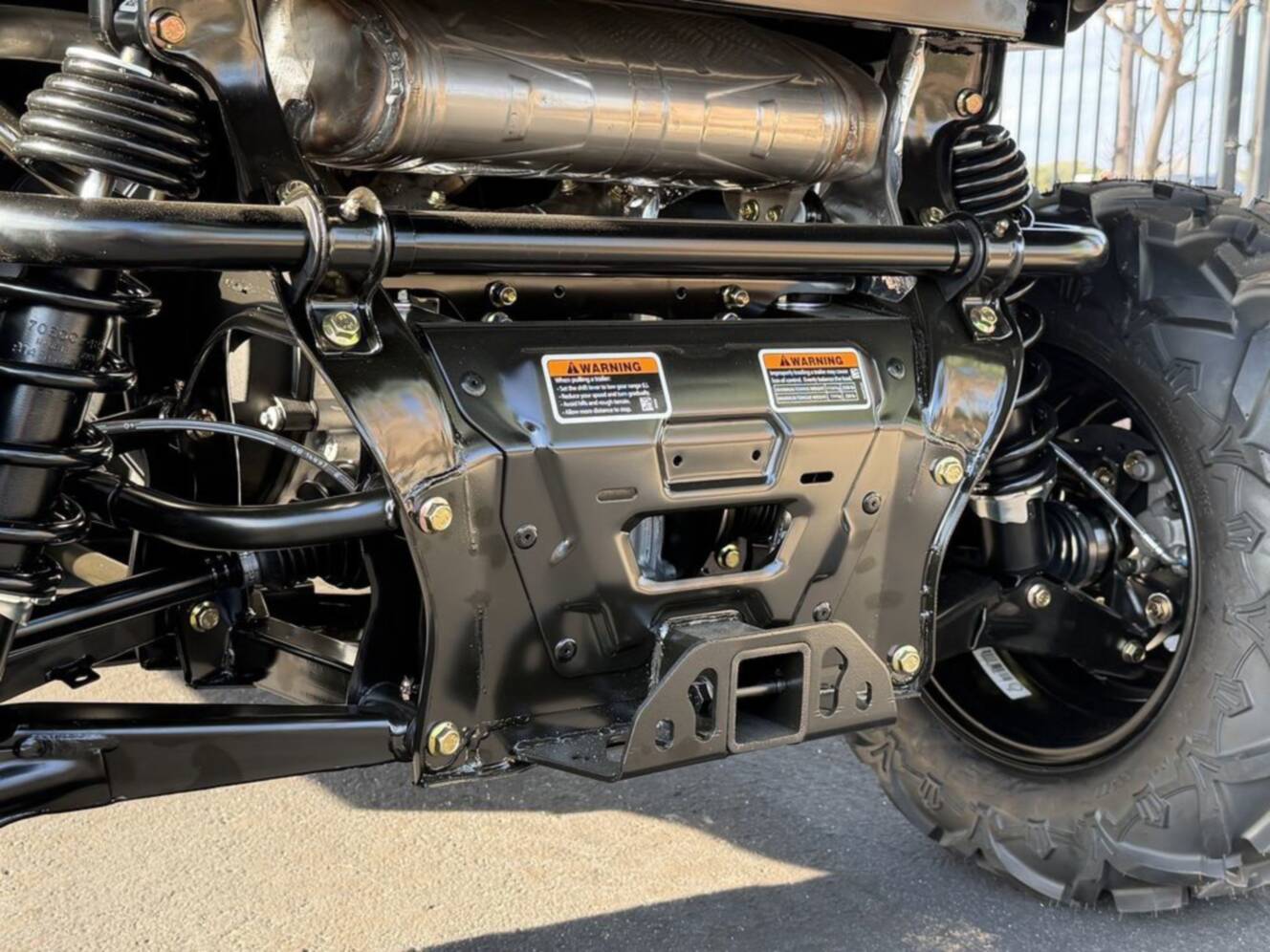 A photo of this 2026 Can-Am Defender DPS HD7 Compass Green
