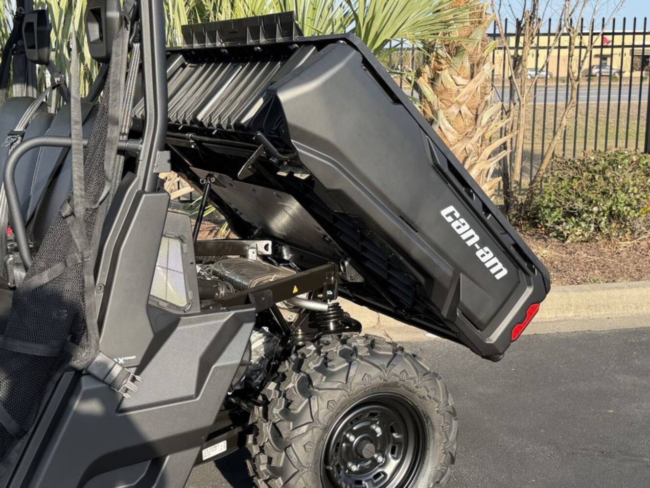 A photo of this 2026 Can-Am Defender DPS HD7 Compass Green