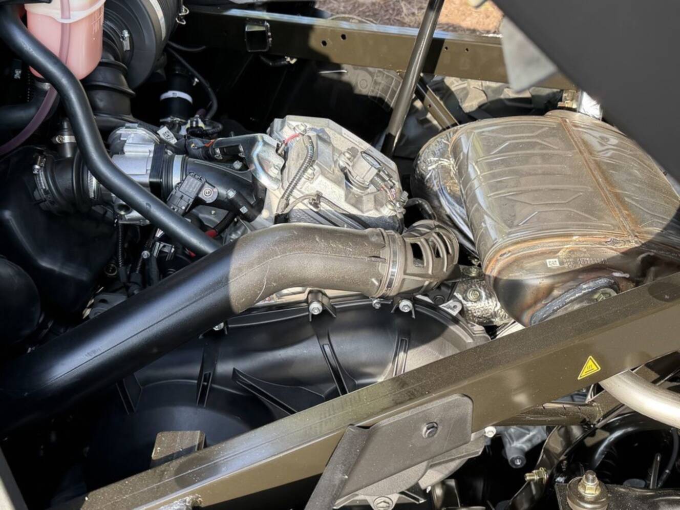 A photo of this 2026 Can-Am Defender DPS HD7 Compass Green