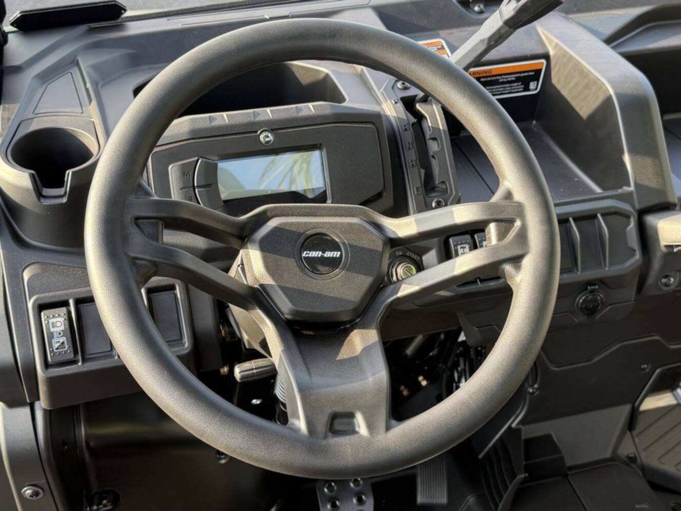 A photo of this 2026 Can-Am Defender DPS HD7 Compass Green