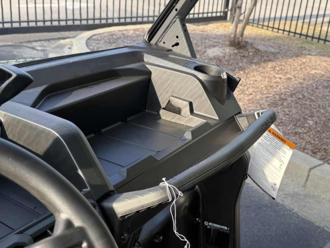 A photo of this 2026 Can-Am Defender DPS HD7 Compass Green