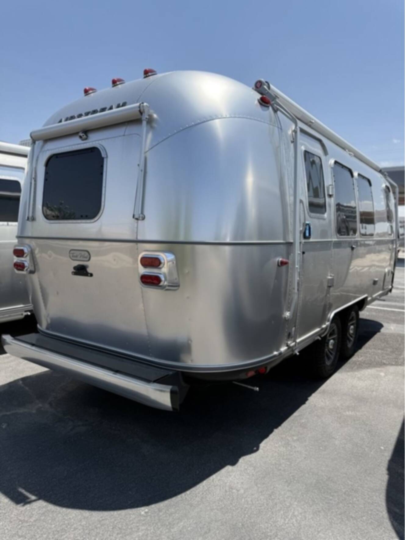 A photo of this 2026 Airstream Trade Wind 23FB