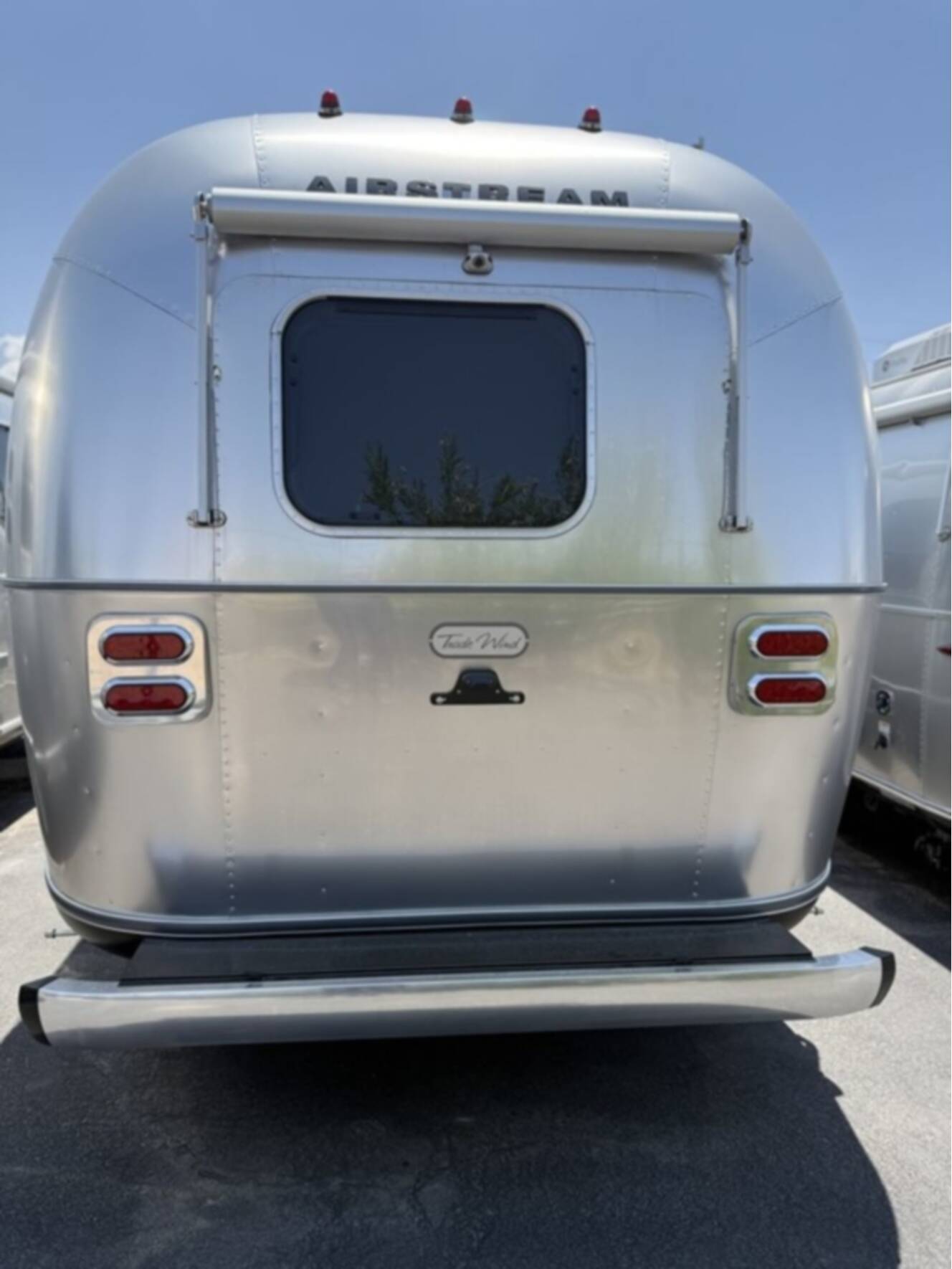 A photo of this 2026 Airstream Trade Wind 23FB