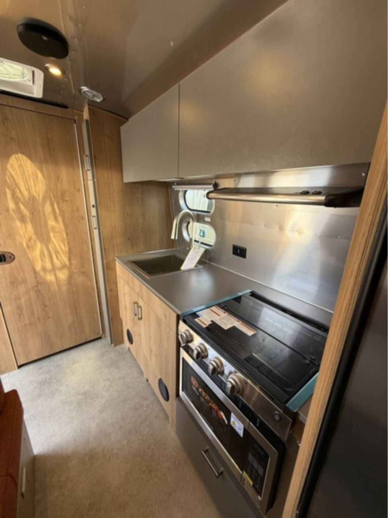 A photo of this 2026 Airstream Trade Wind 23FB