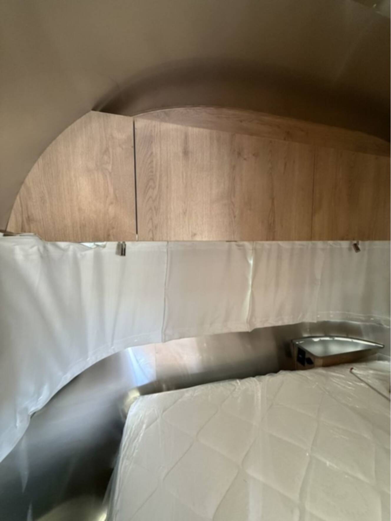 A photo of this 2026 Airstream Trade Wind 23FB