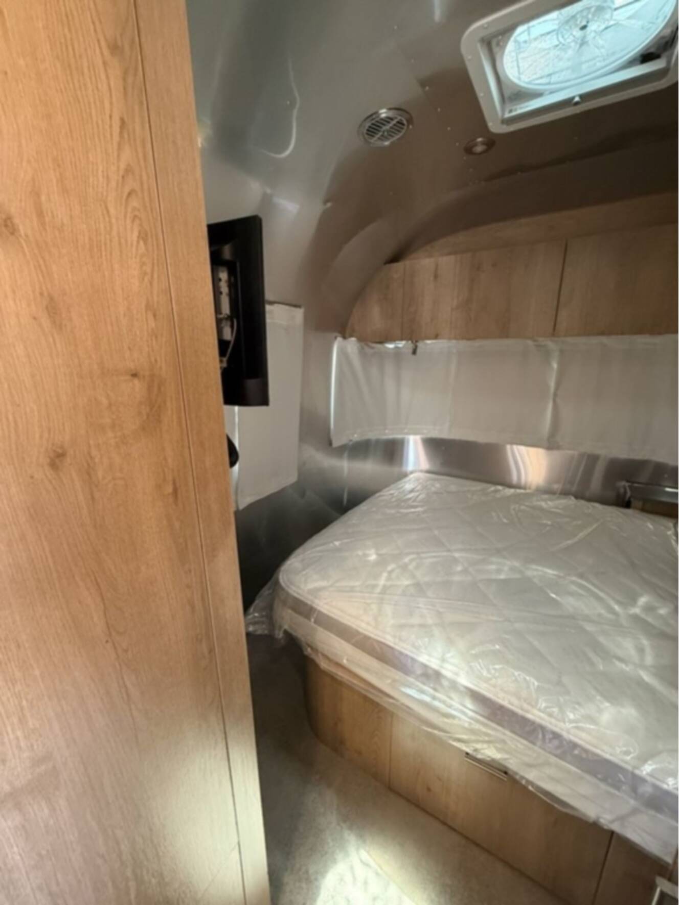 A photo of this 2026 Airstream Trade Wind 23FB