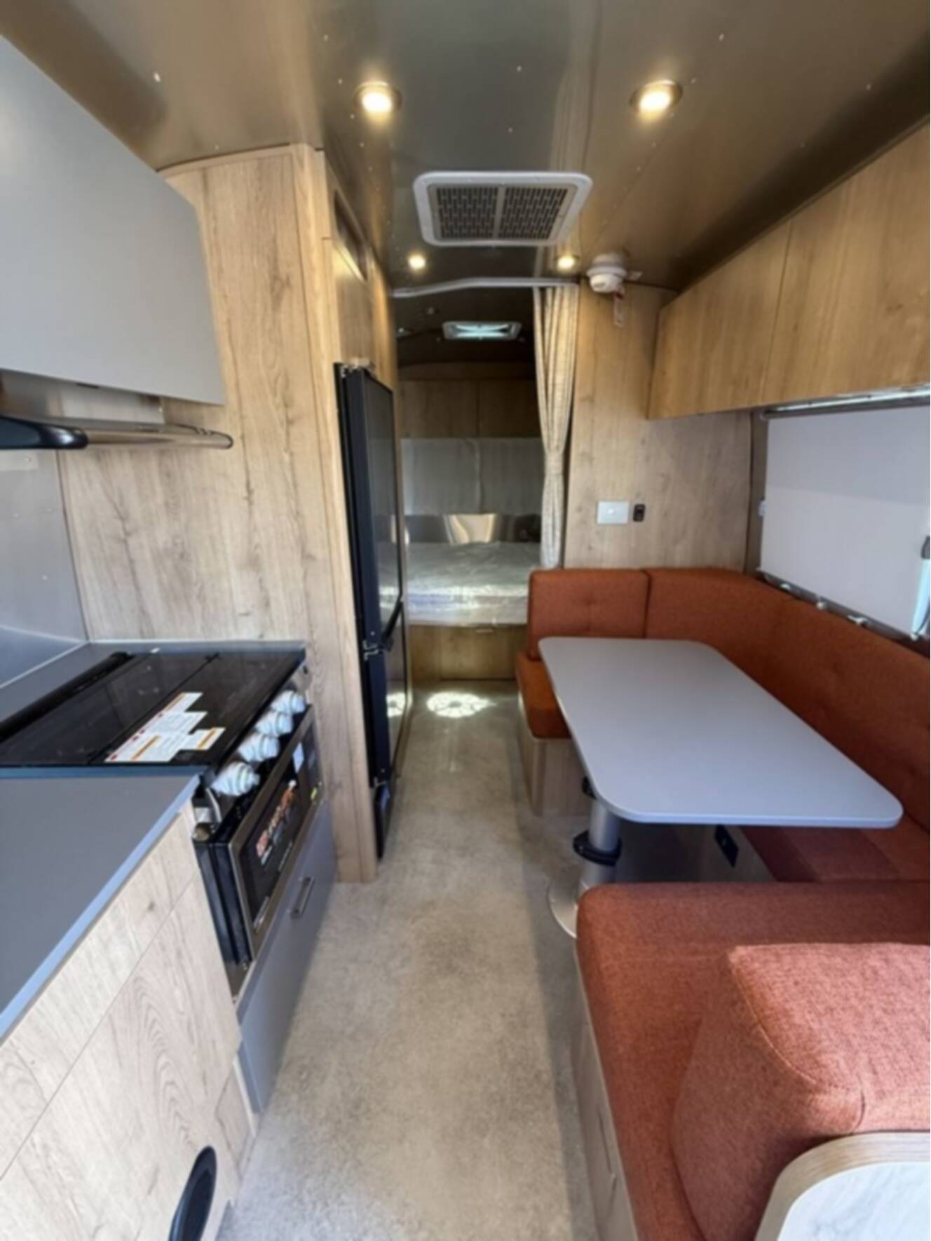 A photo of this 2026 Airstream Trade Wind 23FB