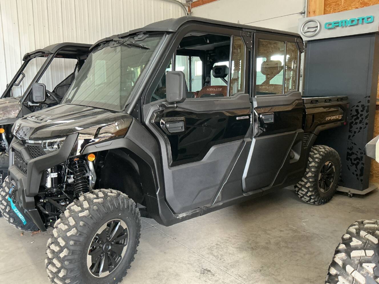 A photo of this 2027 CFMOTO UFORCE U10 XL Pro Highland EPS